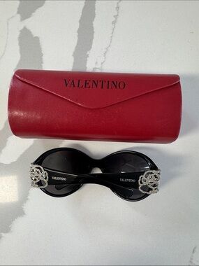 Valentino Black Oval Sunglasses with Crystal Logo Embellishments